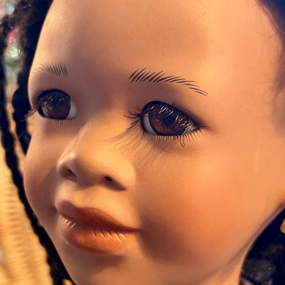 Vintage 1995 “Serena” Porcelain Doll with Traditional African Attire.